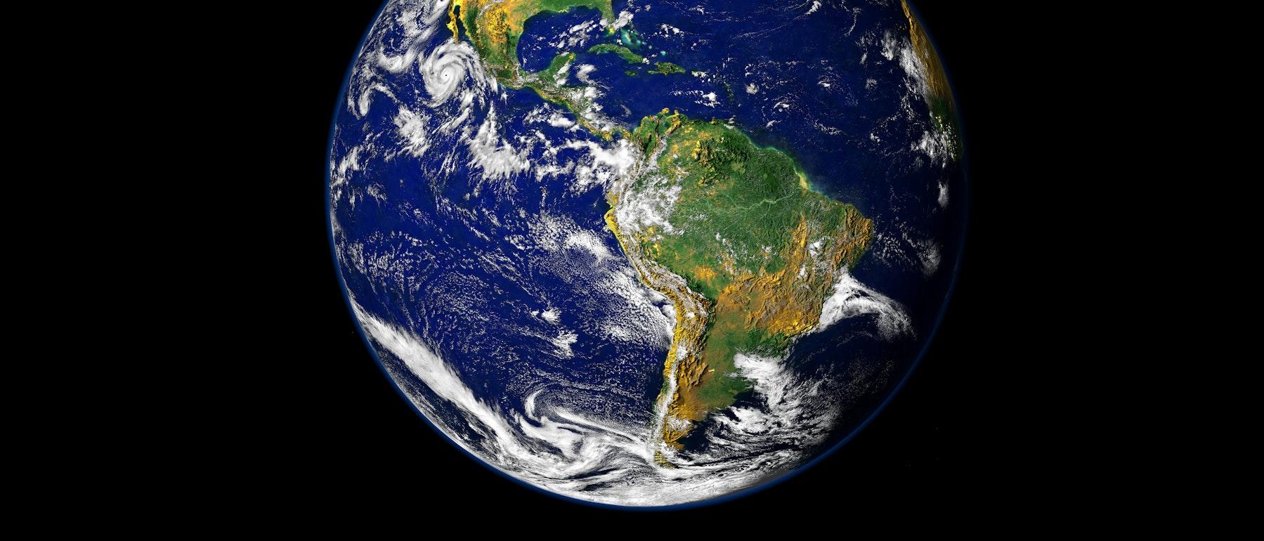 Photo of the earth in black background space with a focus on latin and south america